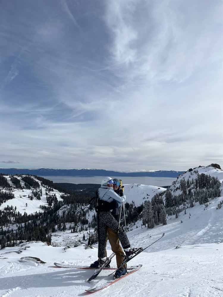 A hug on skis above Lake Tahoe